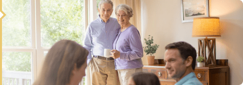 Man and woman with family. Not actual patients.